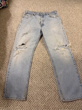 Levi's Light Blue Distressed Straight Jeans